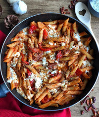 Penne met gegrilde paprika, tomaten en mozarella