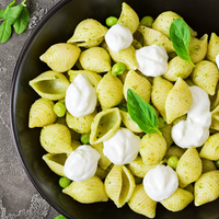 Conchiglie au yaourt aux petits-pois et pignons de pin